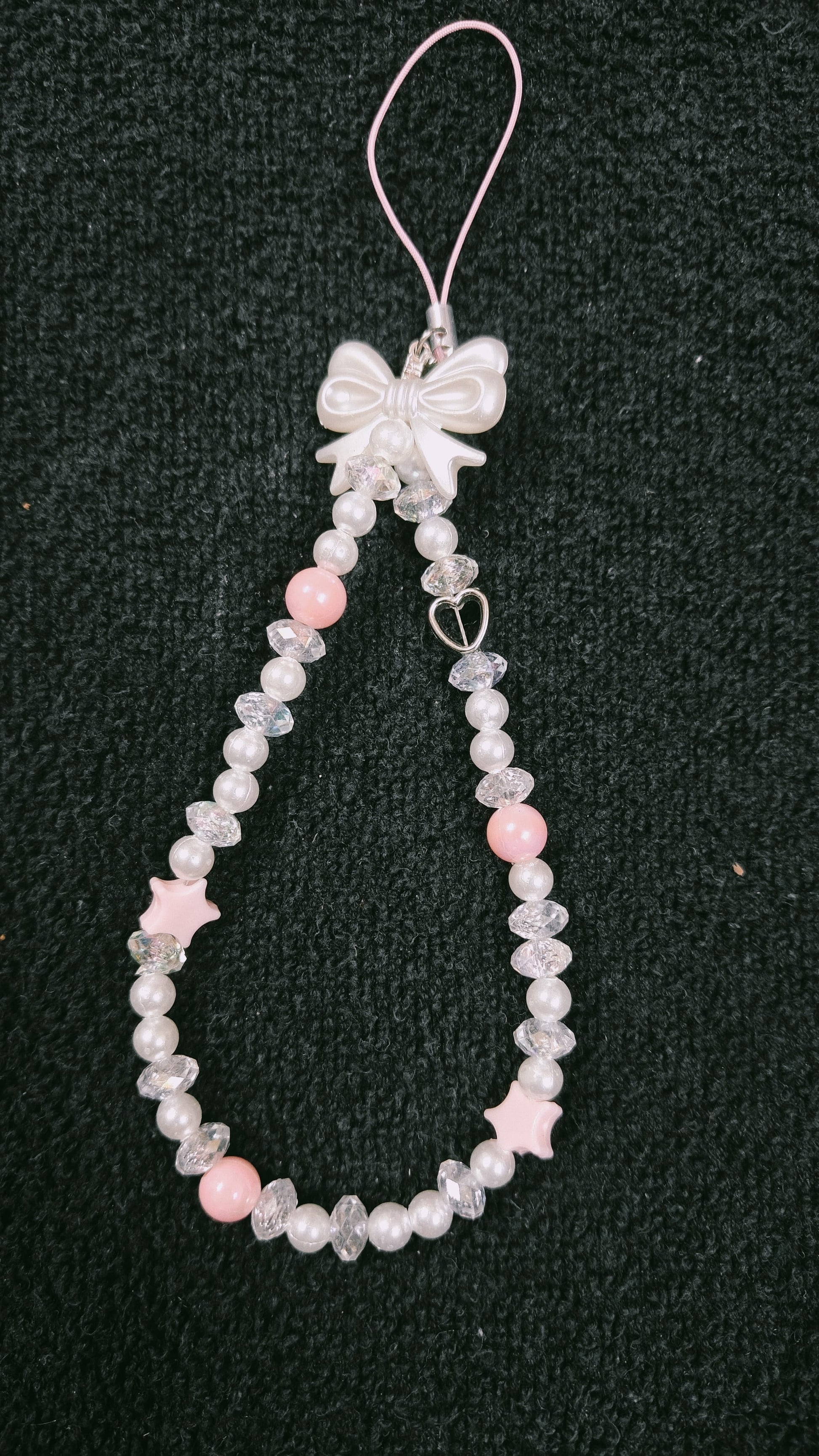 White-pink phone charm